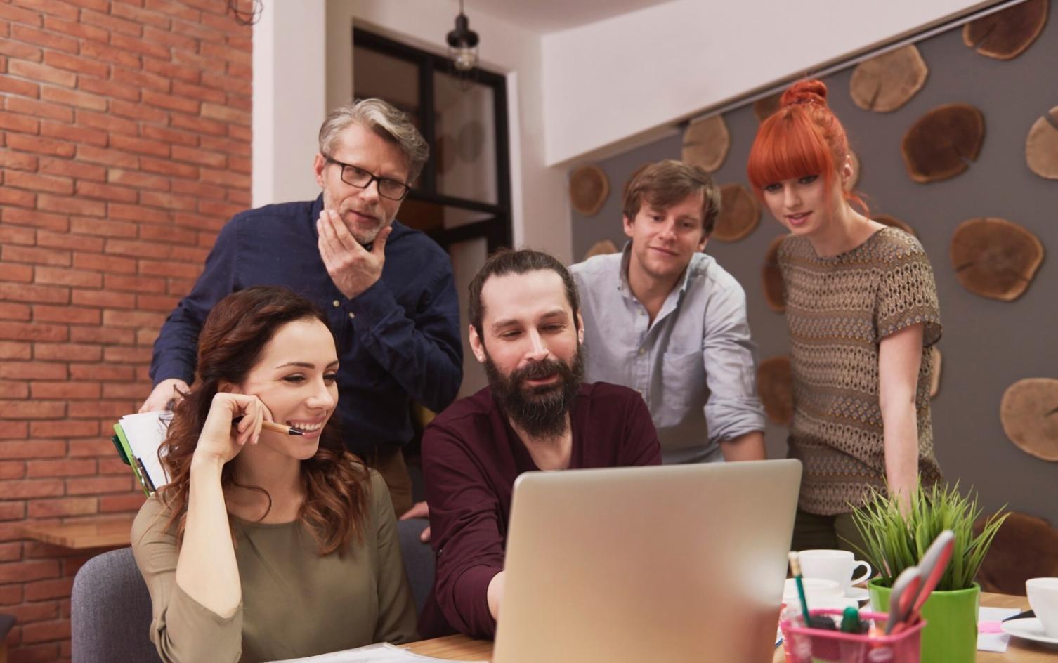 Finance professionals collaborating on communication strategies