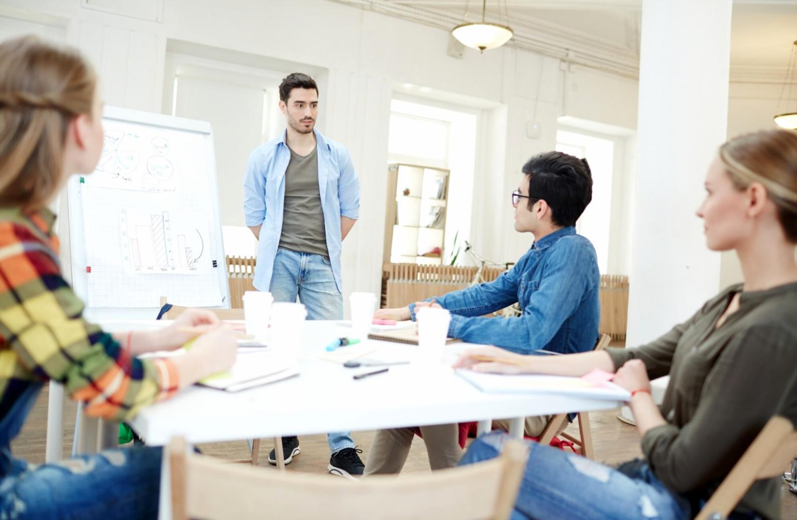 Professional financial communication workspace with documents and digital tools